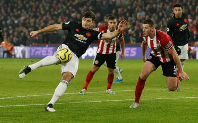 Manchester United's Harry Maguire shoots at goal. Reuters