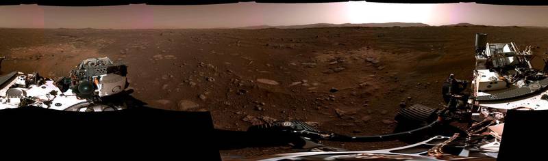 This composite image made available by NASA, produced from photos captured Feb. 20, 2021 by the Perseverance Mars rover, shows the surface of Mars. It landed on Thursday, Feb. 18. (NASA/JPL-Caltech via AP)