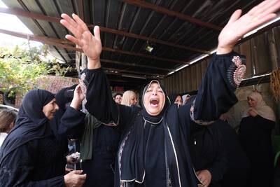 Mourners attend the funeral of one of six Palestinians who were killed in clashes with Israeli settlers at Qusra village near Nablus, in the occupied West Bank, on Thursday. EPA