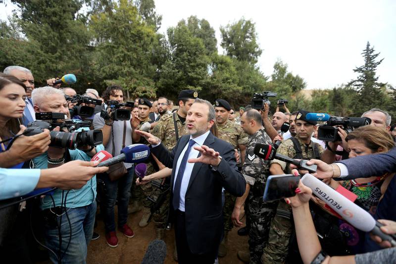 Lebanese Foreign Minister Gebran Bassil gestures as he speaks during a tour for diplomats and journalists near the airport in Beirut, Lebanon October 1, 2018. REUTERS/Aziz Taher