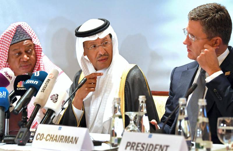 OPEC Secretary General Mohammed Sanusi Barkindo (L), Saudi Arabia's Energy Minister Prince Abdulaziz bin Salman (C) and Russian Energy Minister Alexander Novak (R) attend an Opec-JMMC meeting in the UAE capital Abu Dhabi on September 12, 2019. (Photo by KARIM SAHIB / AFP)