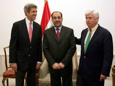 US Democratic senator and former presidential candidate John Kerry, prime minister Nouri Al Maliki and US delegate Christopher Wood in the Green Zone, Baghdad, on December 17, 2006.