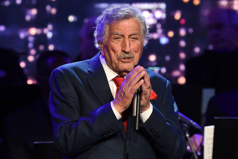 FILE - Singer Tony Bennett performs at the Statue of Liberty Museum opening celebration in New York on May 15, 2019. Bennett has been diagnosed with Alzheimerâ€™s disease but the diagnosis hasnâ€™t quieted his legendary voice. The singerâ€™s wife and son reveal in the latest edition of AARP The Magazine that Bennett was first diagnosed in 2016. The magazine says he endures â€œincreasingly rarer moments of clarity and awareness.â€ (Photo by Evan Agostini/Invision/AP, File)
