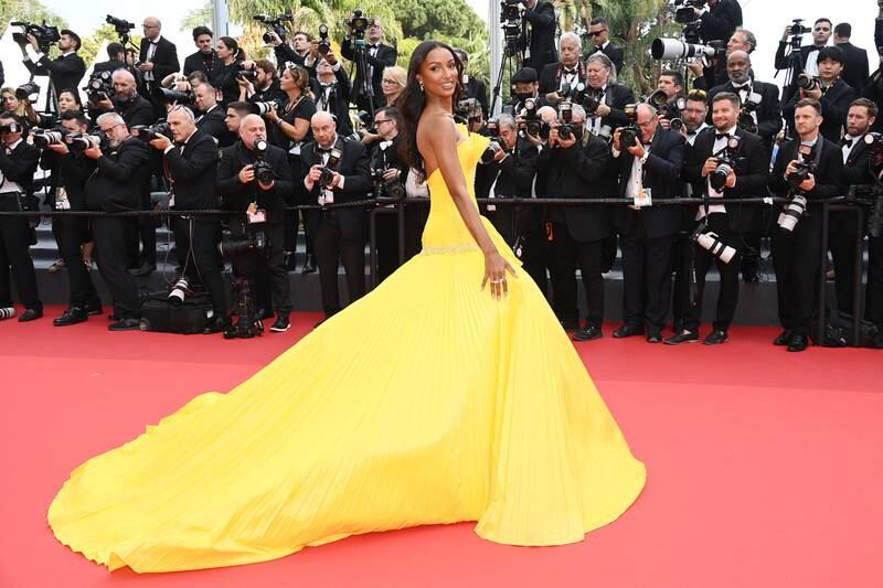 American model Jasmine Tookes wears yellow Tony Ward to attend a screening of 'Top Gun: Maverick' on May 18. Getty Images