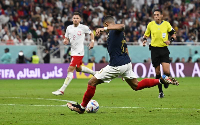 France's Kylian Mbappe scores his team's second goal against Poland. Reuters