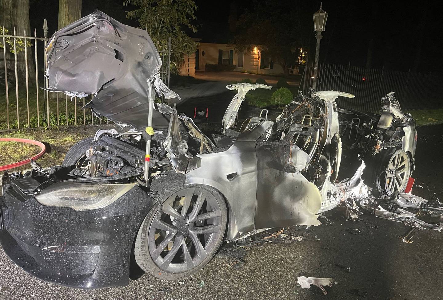 The charred remains of a Tesla Model S Plaid after it caught fire in a suburb of Philadelphia in June. AFP