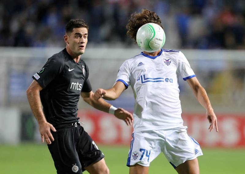 Anorthosis' Amr Warda, right, next to  Sasa Zdjelar of Partizan Belgrade during the  Europa Conference League match as the GSP Stadium in Strovolos, Cyprus, on Thursday, September 16. Reuters