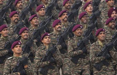 Indian Army commandos march on the ceremonial Rajpath boulevard in the capital, New Delhi. AP