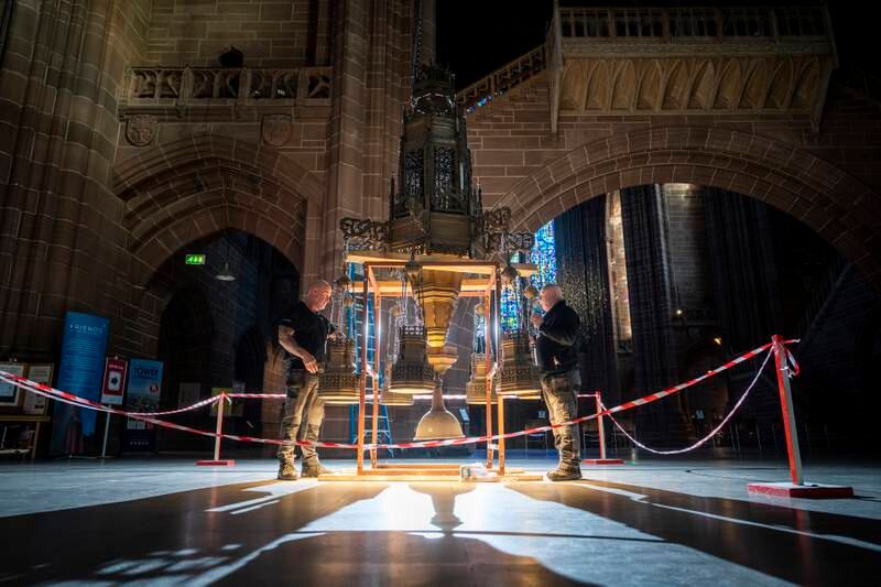 Maintenance engineers carried out the annual spring clean of the Liverpool Cathedral chandeliers on Tuesday. Getty Images