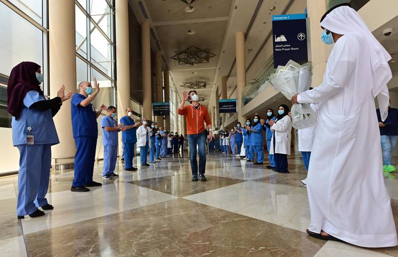 Hiroaki Fujita is applauded by staff as he becomes the final patient to be discharged from the Dubai World Trade Centre field hospital.  All pictures courtesy of AFP