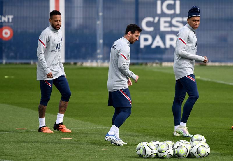 Paris Saint-Germain's forwards Neymar, Lionel Messi and  Kylian Mbappe during a training session on Thursday, April 28, 2022. AFP