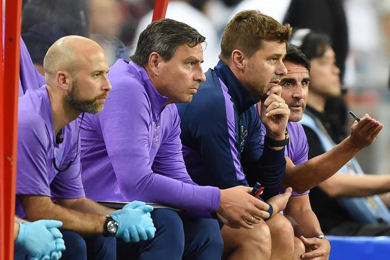 Tottenham manager Mauricio Pochettino, second right, watches the action. AFP