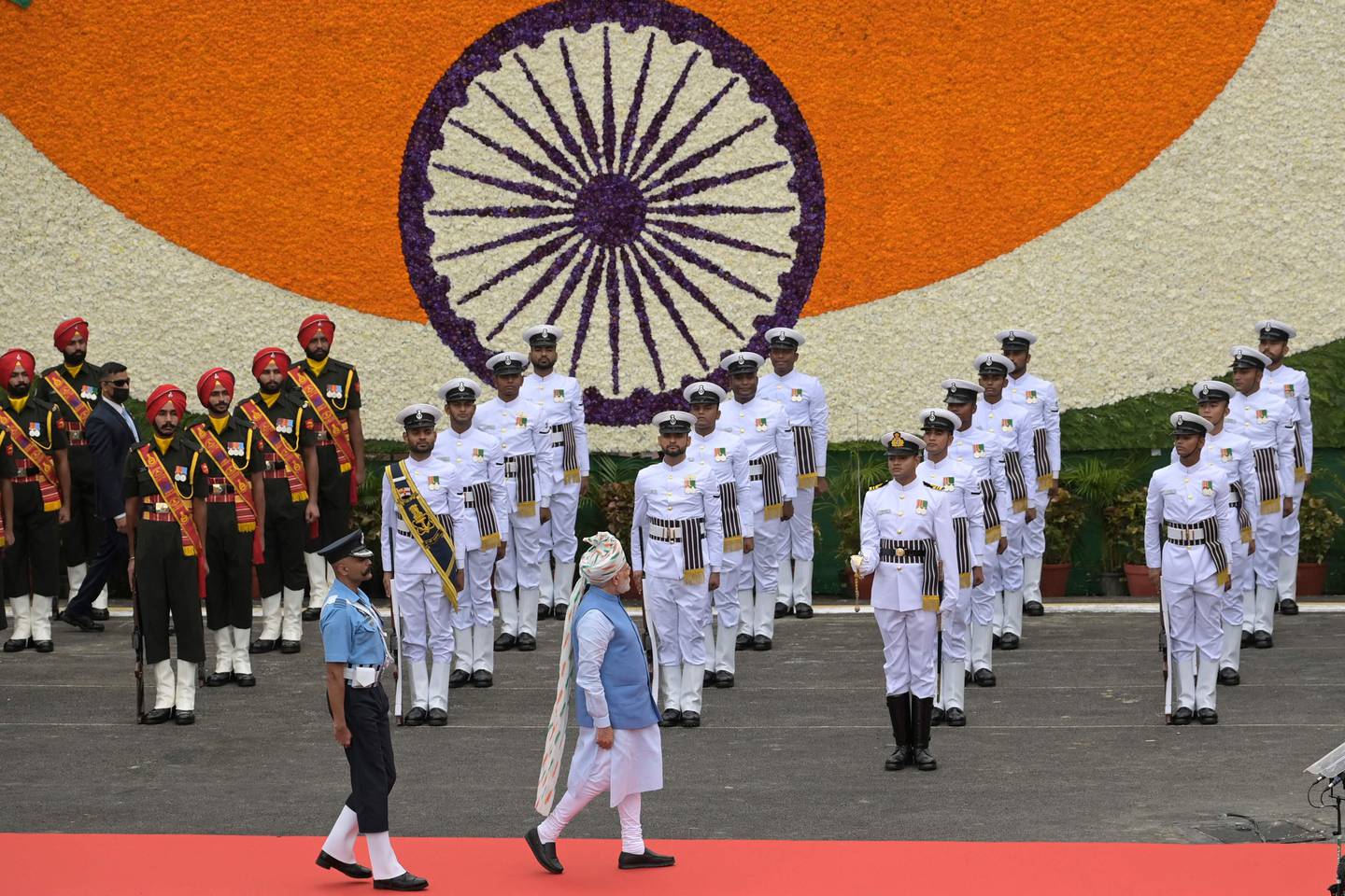 India's Prime Minister Narendra Modi inspects a guard of honour before addressing the nation from the ramparts of the Red Fort, during celebrations to Independence Day in Delhi AFP