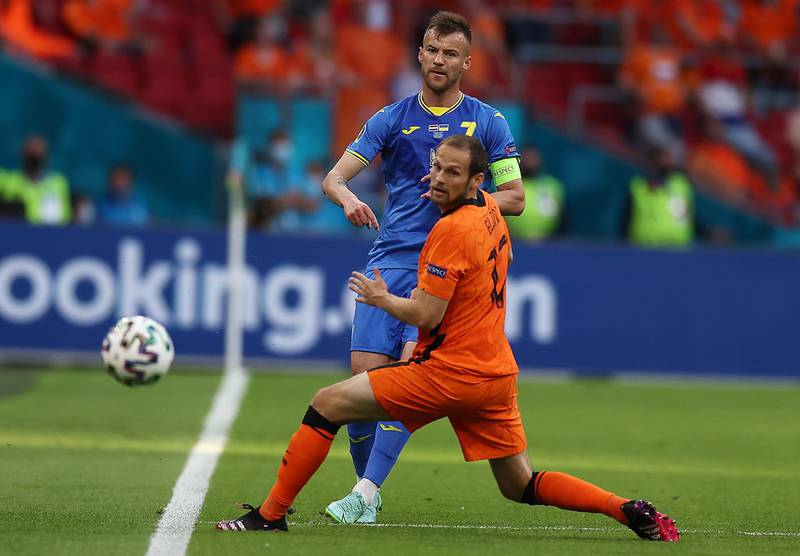 Daley Blind of the Netherlands in action against Andriy Yarmolenko of Ukraine. EPA