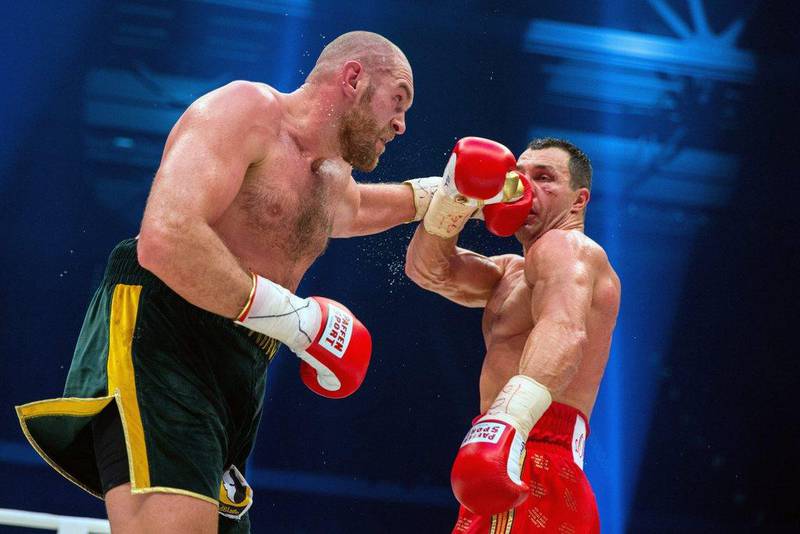Tyson Fury in action against Wladimir Klitschko during their heavyweight title fight, won by Fury.   EPA/Rolf Vennenbernd