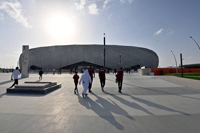 Fans arrive to the Education City Stadium for the Fifa Arab Cup match between Oman and Qatar on December 3, 2021.   EPA