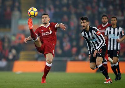 Soccer Football - Premier League - Liverpool vs Newcastle United - Anfield, Liverpool, Britain - March 3, 2018   Liverpool's Dejan Lovren in action with Newcastle United's Mikel Merino     Action Images via Reuters/Carl Recine    EDITORIAL USE ONLY. No use with unauthorized audio, video, data, fixture lists, club/league logos or "live" services. Online in-match use limited to 75 images, no video emulation. No use in betting, games or single club/league/player publications.  Please contact your account representative for further details.