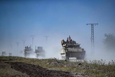 US forces patrol the countryside in the north-eastern Hassakeh province of Syria, near the Turkish border. AFP