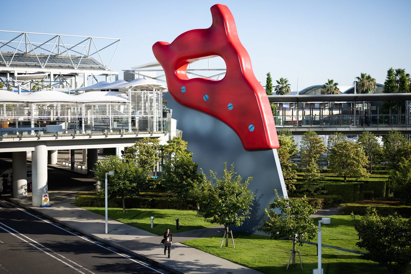 'Saw, Sawing' by Claes Oldenburg and Coosje Van Bruggen outside the Tokyo Olympic Games media centre. Getty Images