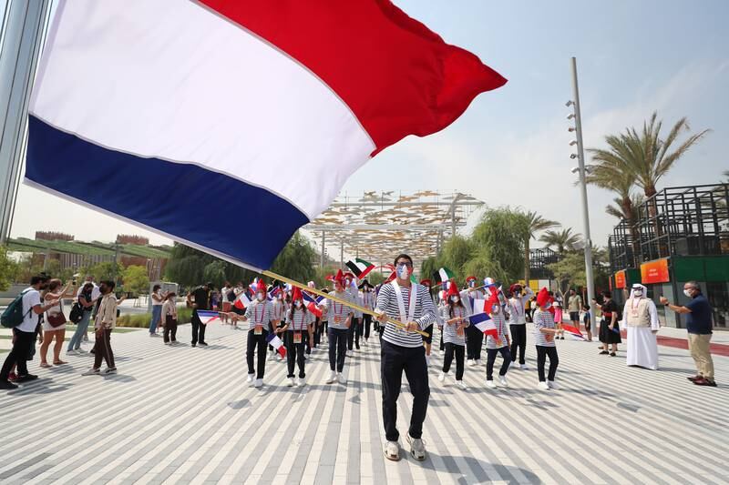Tricolours to the fore as France marks its Expo celebration day. Chris Whiteoak / The National
