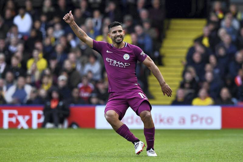 Manchester City's Argentinian striker Sergio Aguero signals a good pass to a teammate during the English Premier League football match between Watford and Manchester City at Vicarage Road Stadium in Watford, north of London on September 16, 2017. / AFP PHOTO / Ben STANSALL / RESTRICTED TO EDITORIAL USE. No use with unauthorized audio, video, data, fixture lists, club/league logos or 'live' services. Online in-match use limited to 75 images, no video emulation. No use in betting, games or single club/league/player publications.  / 