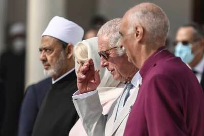 Prince Charles and Camilla at Al Azhar Mosque, the oldest Sunni institution in the Muslim world, with the Grand Imam, left, and the Archbishop of the Anglican Province of Alexandria Samy Fawzy, right.  AP