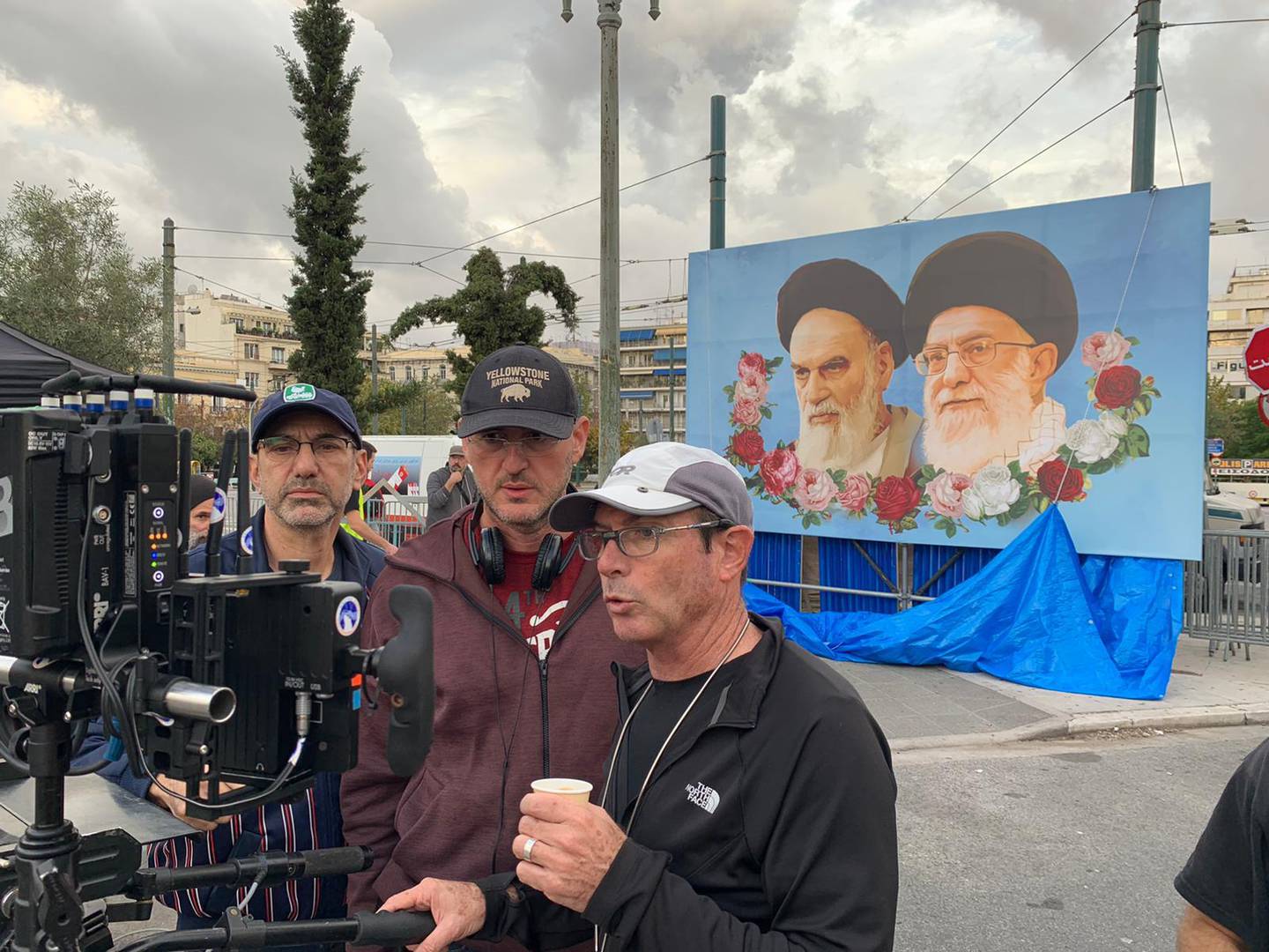 Production designer Yoel Herzberg, left, and cinematographer Giora Bejach, far right, on set of ‘Tehran’, which was filmed in Athens. Yoel Herzberg