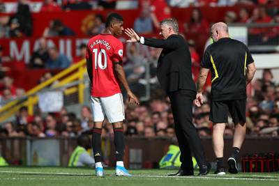 MANCHESTER, ENGLAND - AUGUST 24: Marcus Rashford of Manchester United talks to manager Ole Gunnar Solskjaer during the Premier League match between Manchester United and Crystal Palace at Old Trafford on August 24, 2019 in Manchester, United Kingdom. (Photo by Jan Kruger/Getty Images)