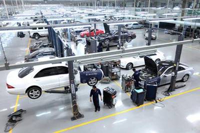 Cars undergo a service at the Mercedes-Benz Service Centre in Abu Dhabi. Car service business picked up during the downturn as drivers became more focused on maintaining rather than purchasing cars.