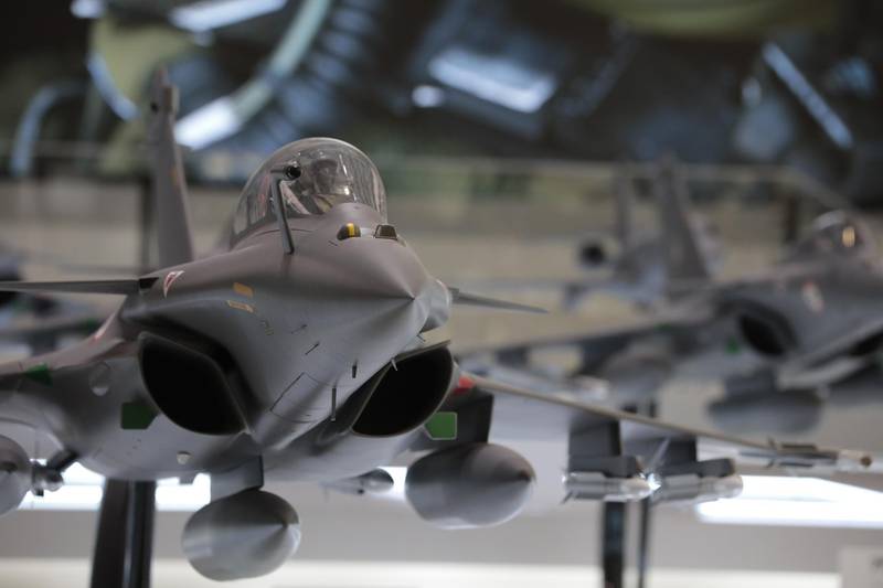 A model Rafale B fighter jet, manufactured by Dassault Systemes SE, sits on display. Bloomberg