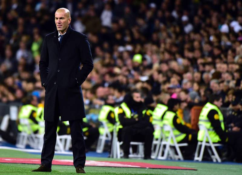 Real Madrid’s French manager Zinedine Zidane stands on the sideline. Gerard Julien / AFP
