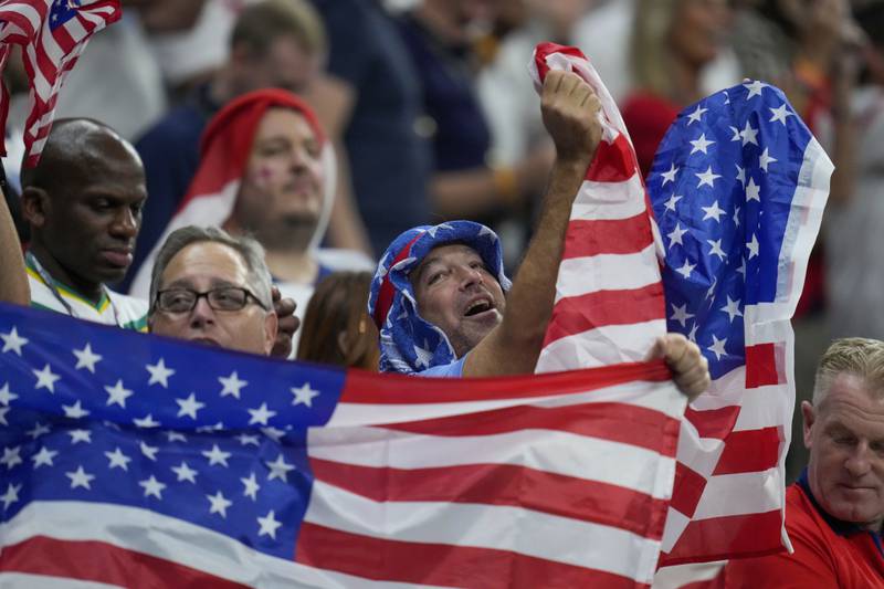 US supporters cheer their team before the start of the  match between England and USA. AP