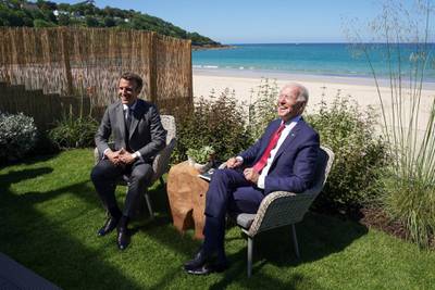 US President Joe Biden and France's President Emmanuel Macron attend a bilateral meeting. Reuters