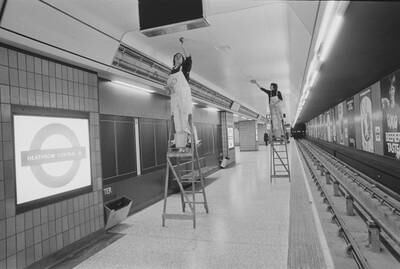 Men at work finalising the Heathrow Central underground station before its opening in 1977.