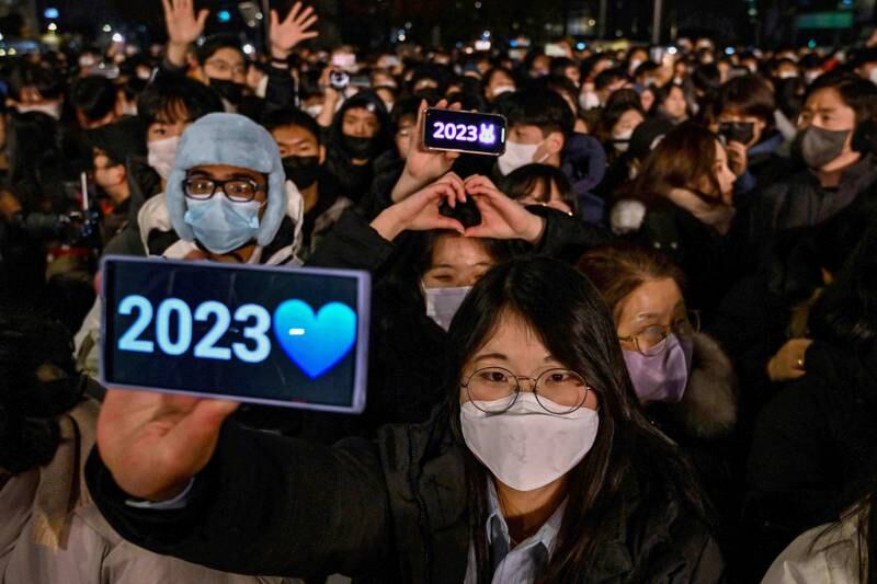 Celebrations after midnight at an event to mark the New Year at the Bosingak Pavilion in Seoul, South Korea. 
 AFP