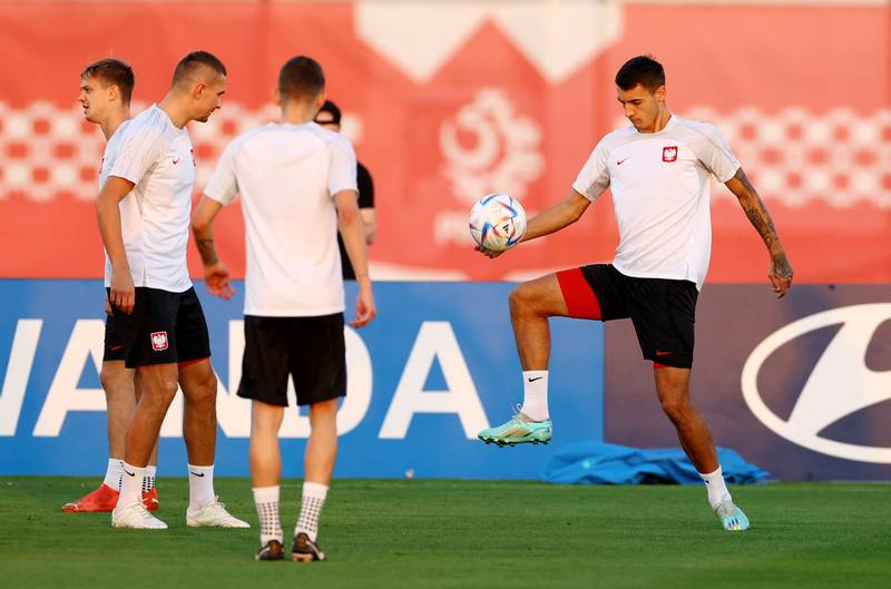 Jakub Kiwior and his Poland teammates during a training session at Al Kharaitiyat SC. Reuters