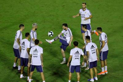 Messi controls the ball as he trains with his teammates in Salvador. AP Photo