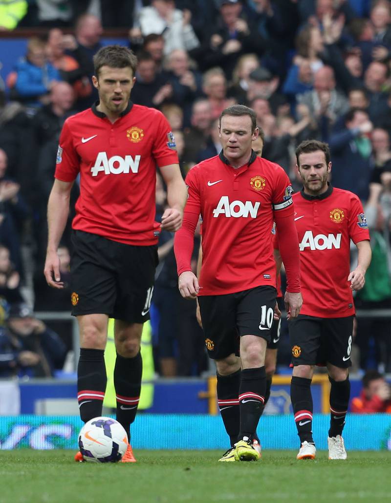 Michael Carrick, Wayne Rooney and Juan Mata show their disappointment during the 2013-14 season, when United finished in seventh with 64 points, currently their lowest ever tally. Getty