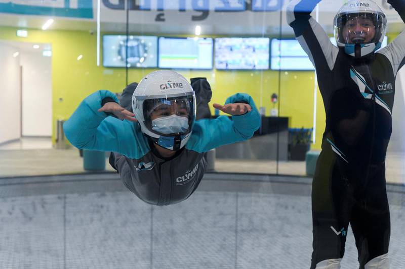 Abu Dhabi, United Arab Emirates - Samih, 9, takes flight during the indoor skydiving adventure at CLYMB, Yas Island. Khushnum Bhandari for The National