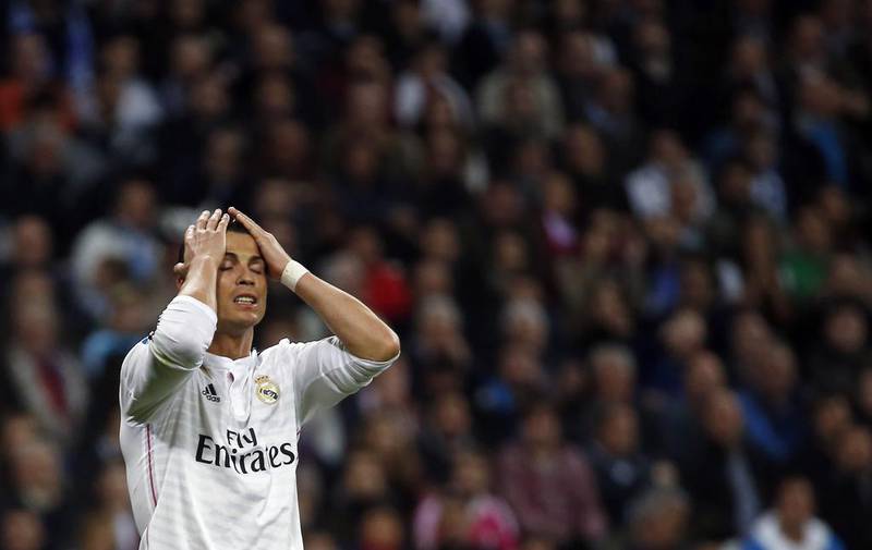 Real Madrid's Cristiano Ronaldo reacts after a missed scoring opportunity against Villarreal during their Primera Liga match at Santiago Bernabeu stadium in Madrid on March 1, 2015. Susana Vera / Reuters