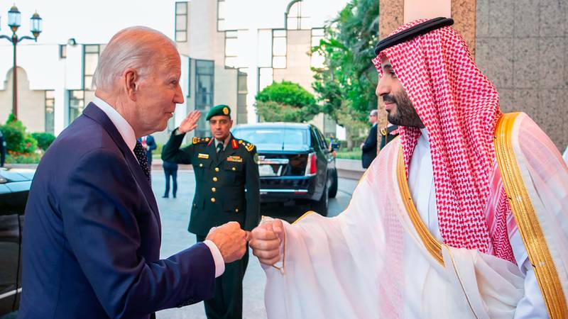 Saudi Crown Prince Mohammed bin Salman greets US President Joe Biden after his arrival in Jeddah last July. Saudi Press Agency via AP