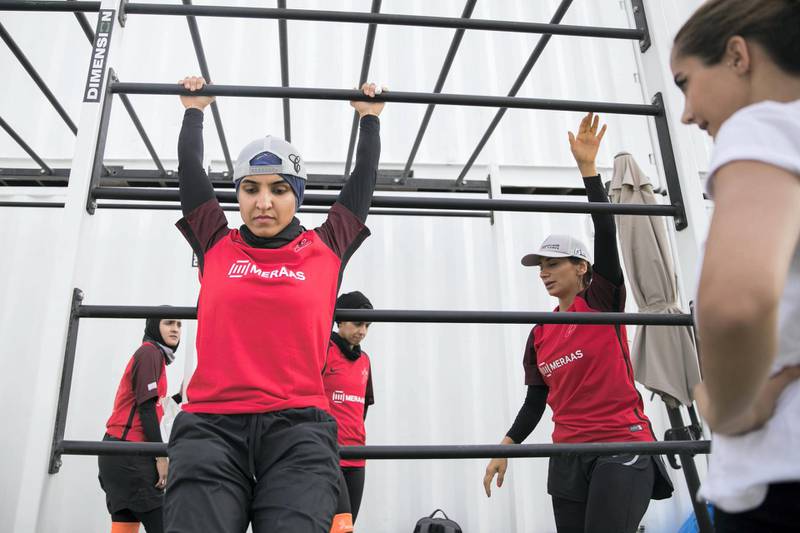 DUBAI, UNITED ARAB EMIRATES - MAY 12, 2018. Female government employees warm up compete at the last day of Dubai Government Games. Set in motion by the Crown Prince of Dubai,  Sheikh Hamdan bin Mohammed, the event sees teams of Government workers pitted against each other in a bid to be Gov Games champions.The competition is held on Kite Beach.(Photo by Reem Mohammed/The National)Reporter: Section: NA