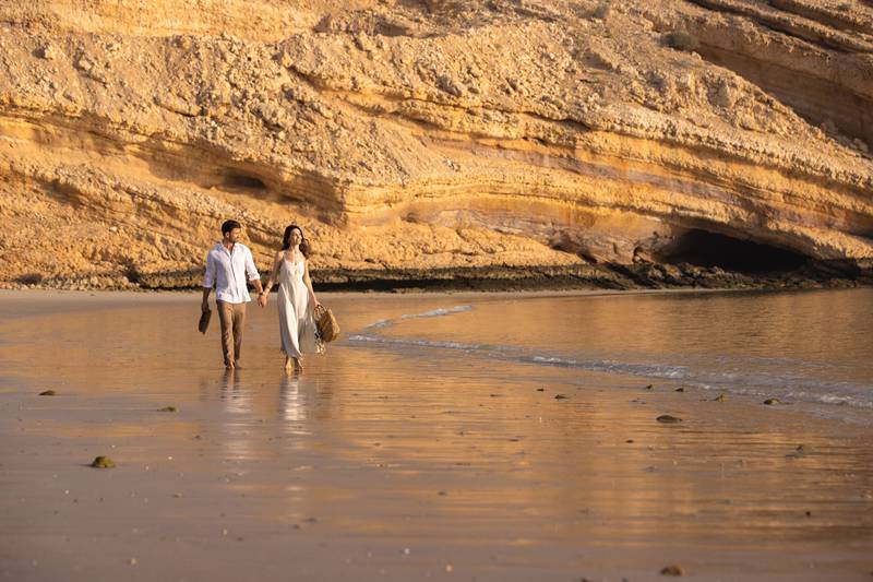 Sunset strolls on a private shoreline await at Jumeirah Muscat Bay.