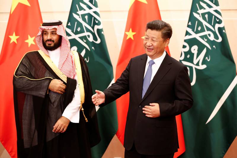 Mr Xi and Saudi Arabia's Deputy Crown Prince Mohammed bin Salman meet before the G20 summit in Beijing in August 2016.