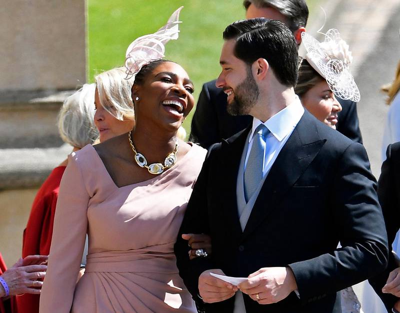 Serena Williams, in a dusky pink Versace dress, and Alexis Ohanian arrive for the royal wedding ceremony of Britain's Prince Harry and Meghan Markle at St George's Chapel in Windsor Castle, in Windsor on May 19, 2018. EPA