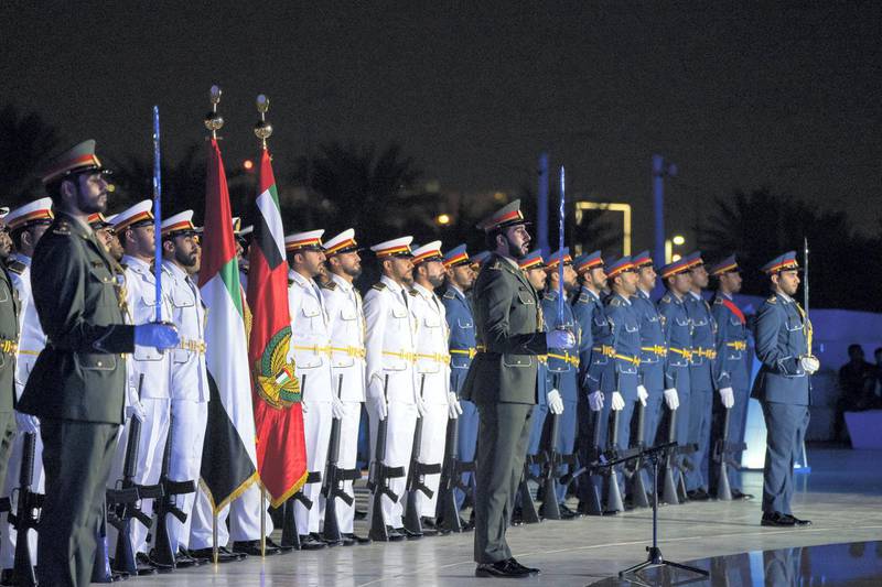 ABU DHABI, UNITED ARAB EMIRATES - November 30, 2019: UAE Armed Forces honour guard participate in a Commemoration Day ceremony at Wahat Al Karama, a memorial dedicated to the memory of UAE’s National Heroes in honour of their sacrifice and in recognition of their heroism.
( Ryan Carter / Ministry of Presidential Affairs )