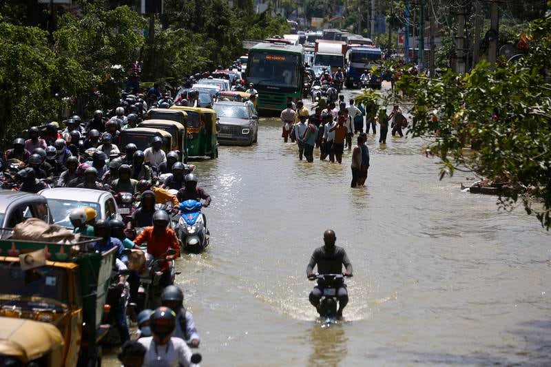 This is the second time in a week that heavy rain has wreaked havoc in the IT hub of the country, bringing life to a standstill. On Sunday, heavy rainfall caused flooding in low-lying residential areas and choked roads. EPA