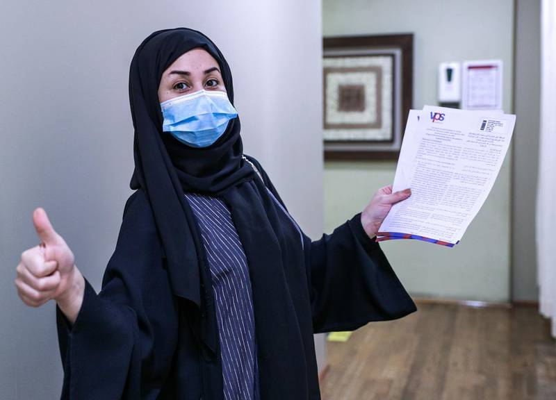 Abu Dhabi, United Arab Emirates, December 13, 2020.  Aysha Mohammed Ahmad Ali went to Abu Dhabi from Al Ain to get vaccinated at the Burjeel Hospital.Victor Besa/The NationalSection:  NA