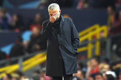 (FILES) In this file photo taken on November 27, 2018 Manchester United's Portuguese manager Jose Mourinho reacts during the UEFA Champions League group H football match between Manchester United and Young Boys at Old Trafford in Manchester, north-west England. - Manchester United have sacked manager Jose Mourinho after a dreadful series of results, the Premier League club announced on December 18, 2018. The 55-year-old Portuguese's last match in charge was the 3-1 defeat by league leaders Liverpool on Sunday which left them 19 points behind their opponents. (Photo by Oli SCARFF / AFP)