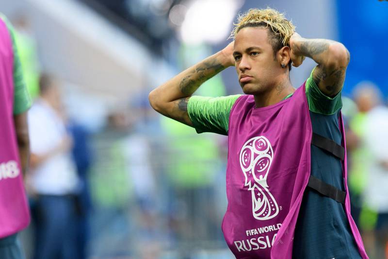 epa06813574 Brazil's national soccer team forward Neymar reacts during a trinaing session on the eve of the group E match between Switzerland and Brazil of the FIFA soccer World Cup 2018 at the Rostov Arena, in Rostov-on-Don, Russia, Saturday, June 16, 2018.  EPA/LAURENT GILLIERON   EDITORIAL USE ONLY  EDITORIAL USE ONLY